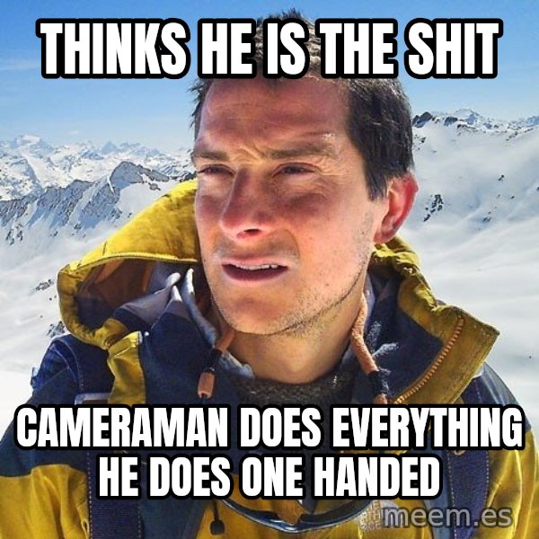Bear Grylls Loneliness meme: thinks he is the shit / cameraman does everything he does one handed