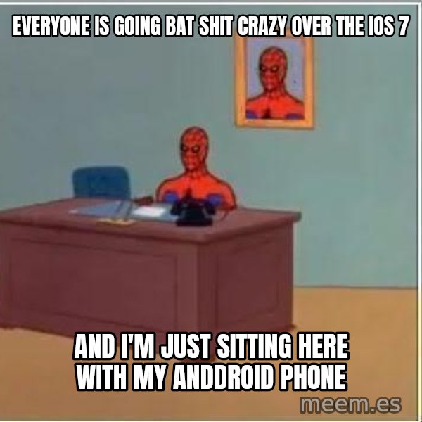 Spiderman Desk meme: Everyone is going bat shit crazy over the iOS 7 / And I'm just sitting here with my Anddroid phone
